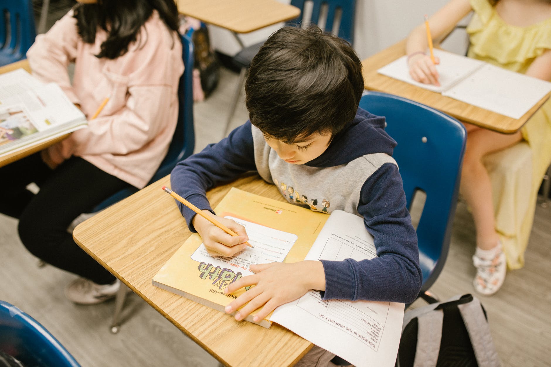 boy studying and doing his homework